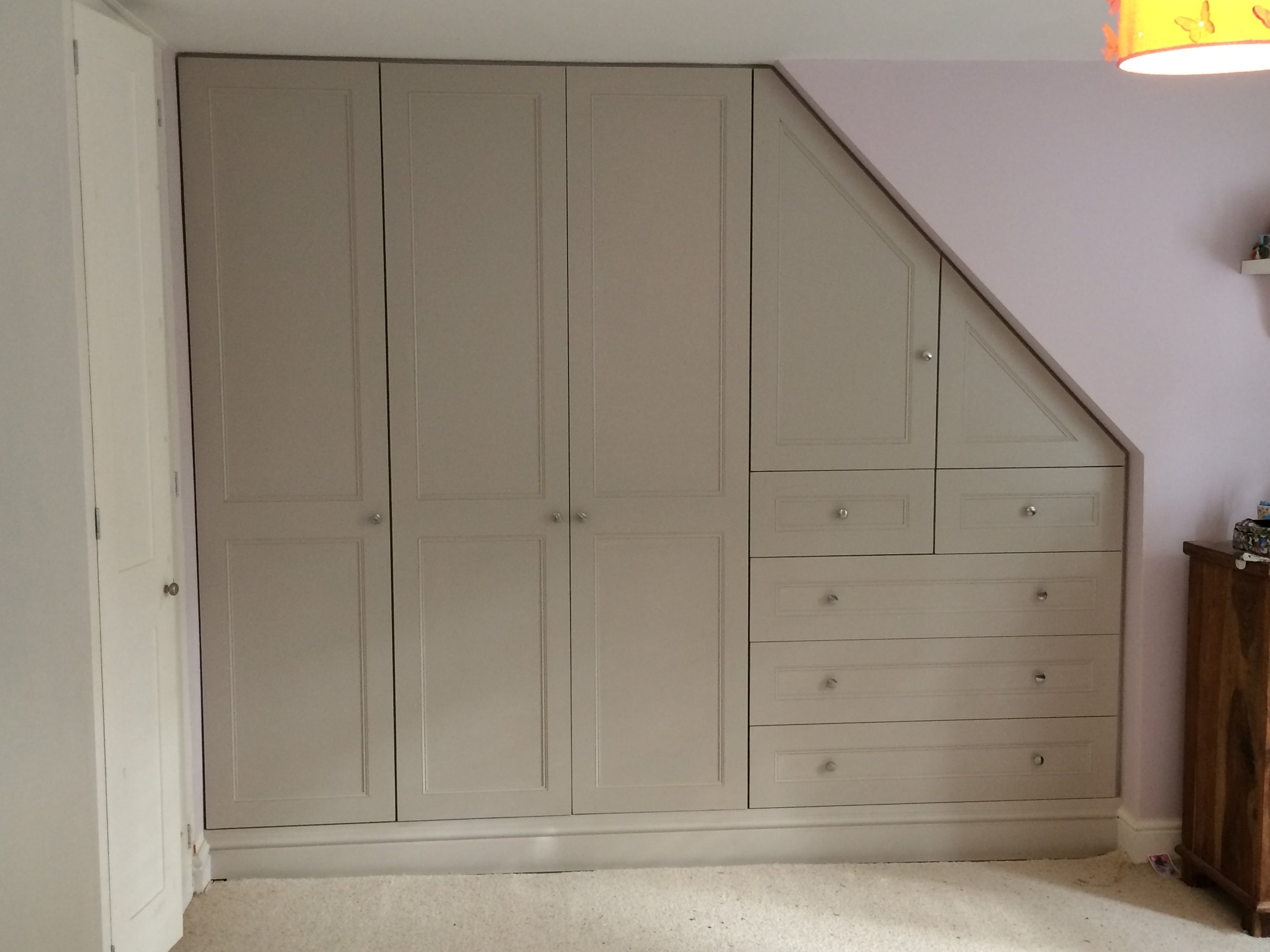 Fitted wardrobes under stairs deals